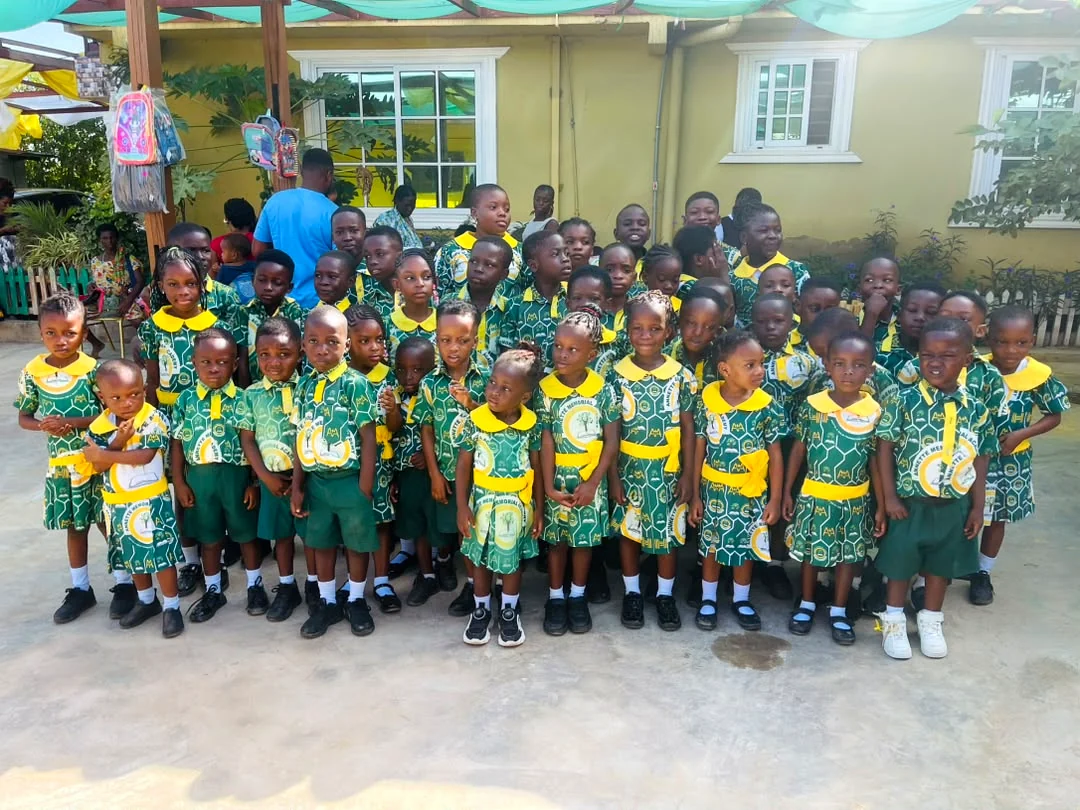 A full class of ASMA pupils posing for a group photograph