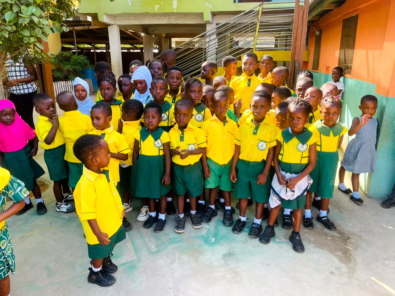 ASMA pupils standing in the school courtyard before lessons