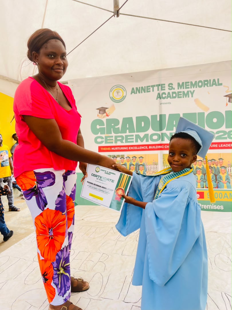 A pupil receiving a certificate of honour