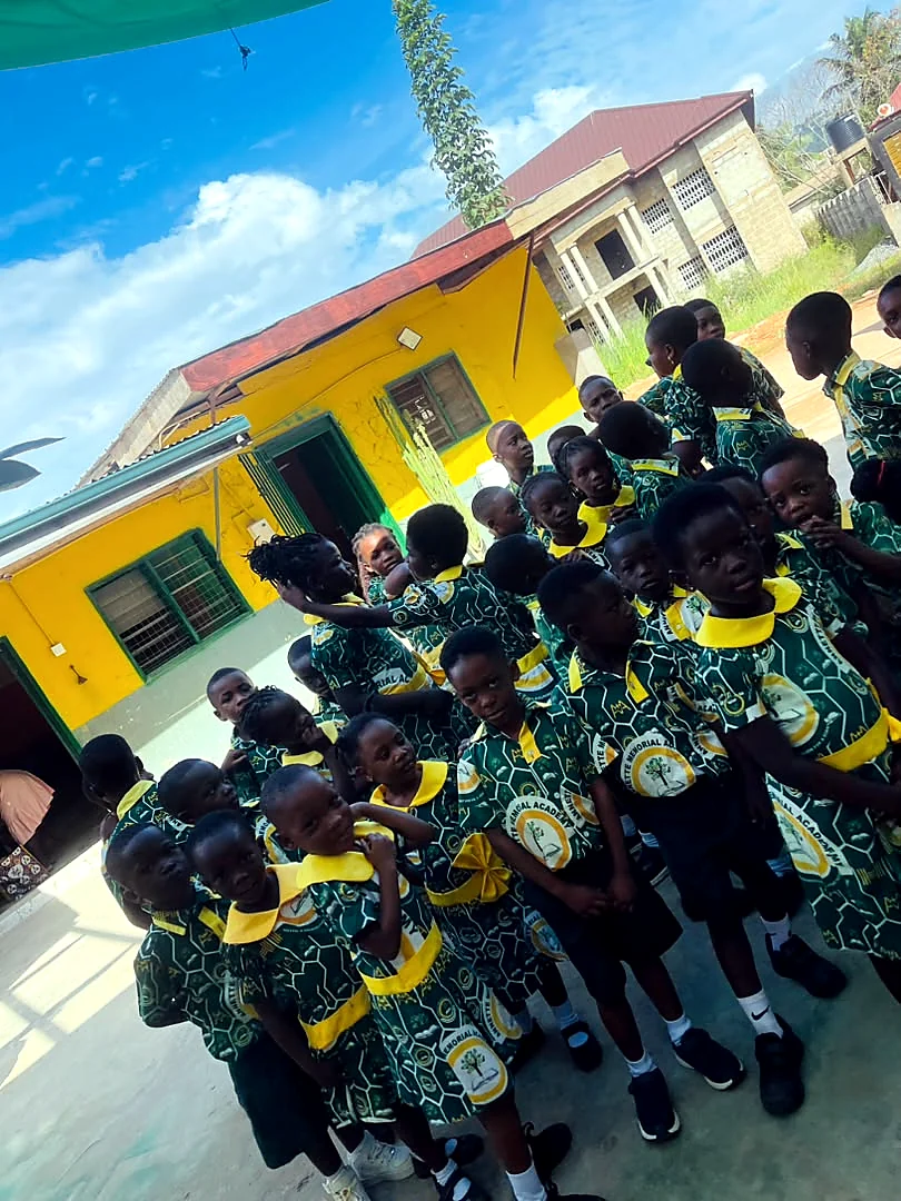 A large group of ASMA pupils in the school courtyard